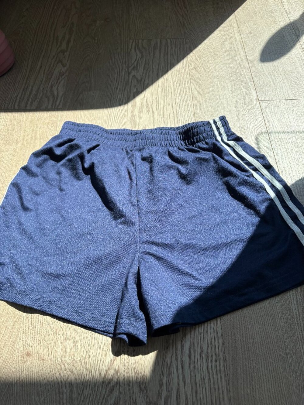 blue shorts with white strips (size s)